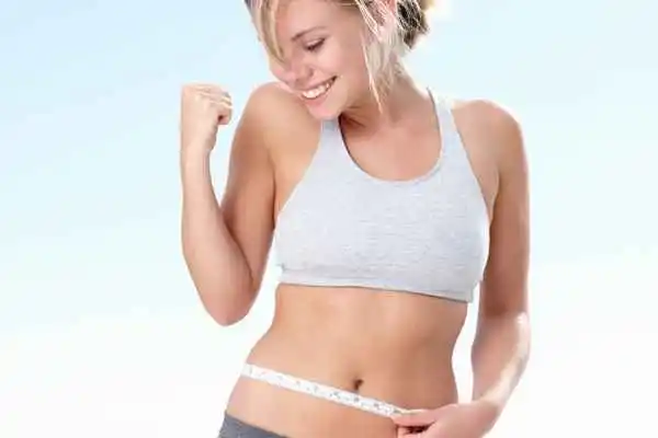 woman happy after fat reduction treatment Northampton
