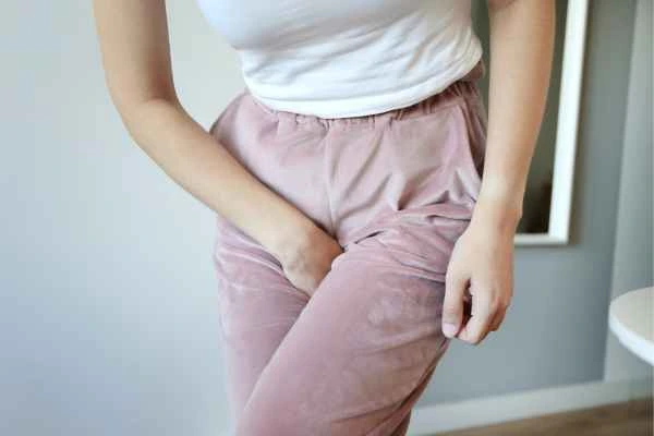 older woman running to the toilet because of urinary incontinence Northampton
