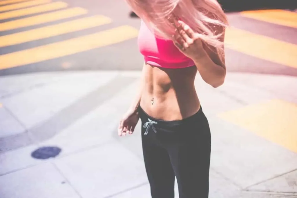 Woman with toned stomach after LA-EMS Body Sculpting Treatment Northampton